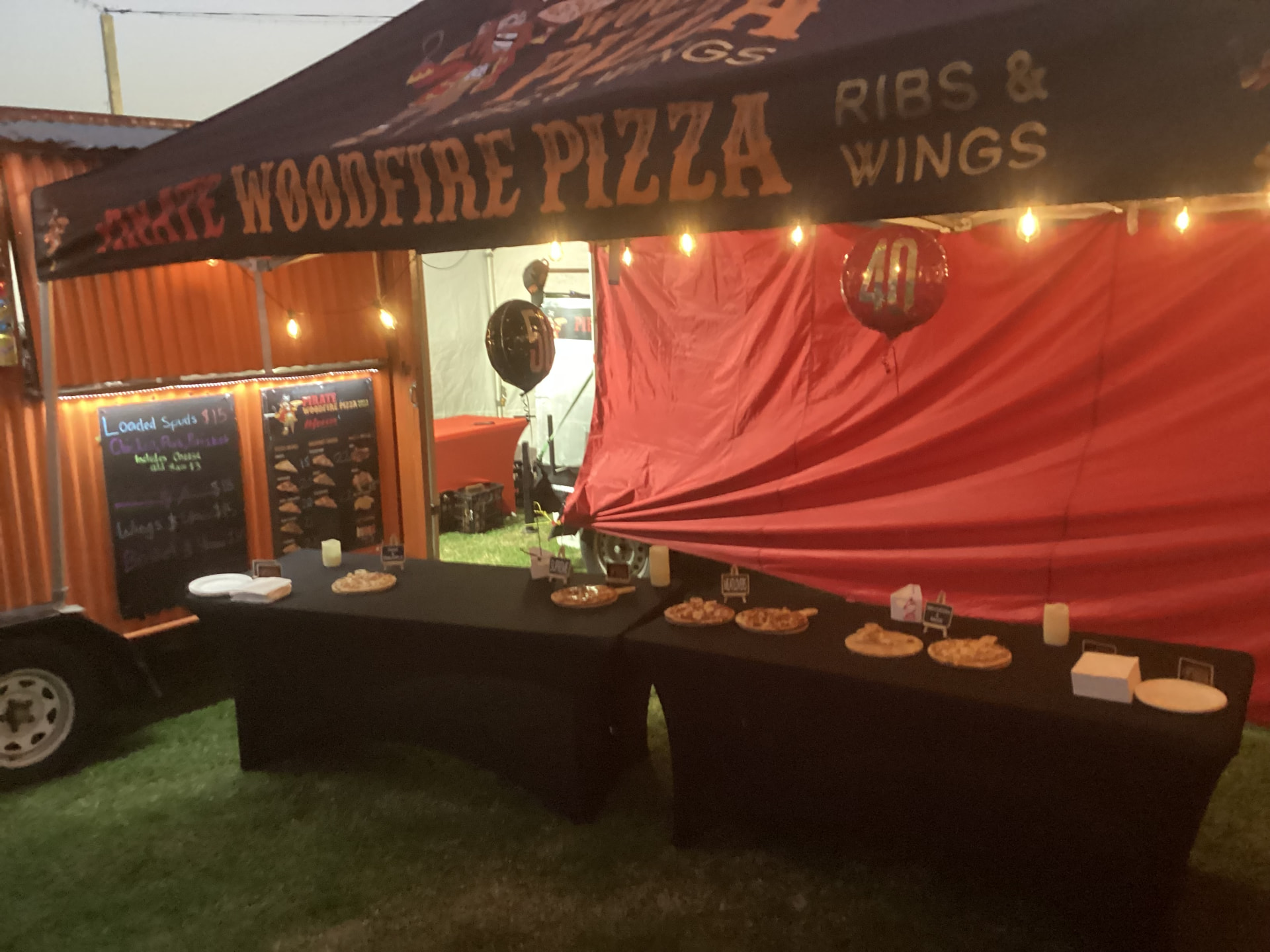 Pirate Woodfire Eats stall set up at an event